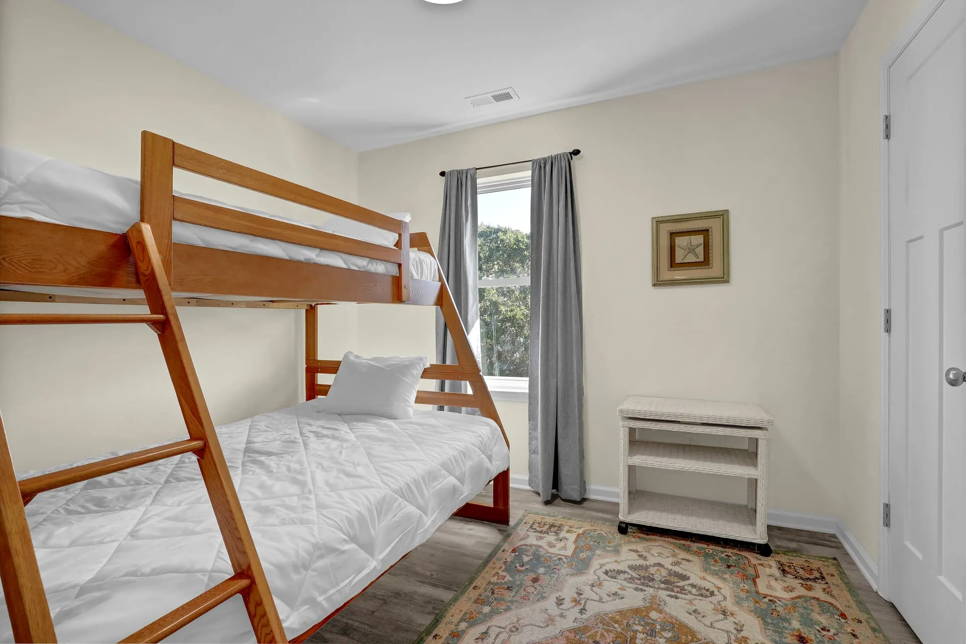 Bunk room with twin-over-double wood bunk